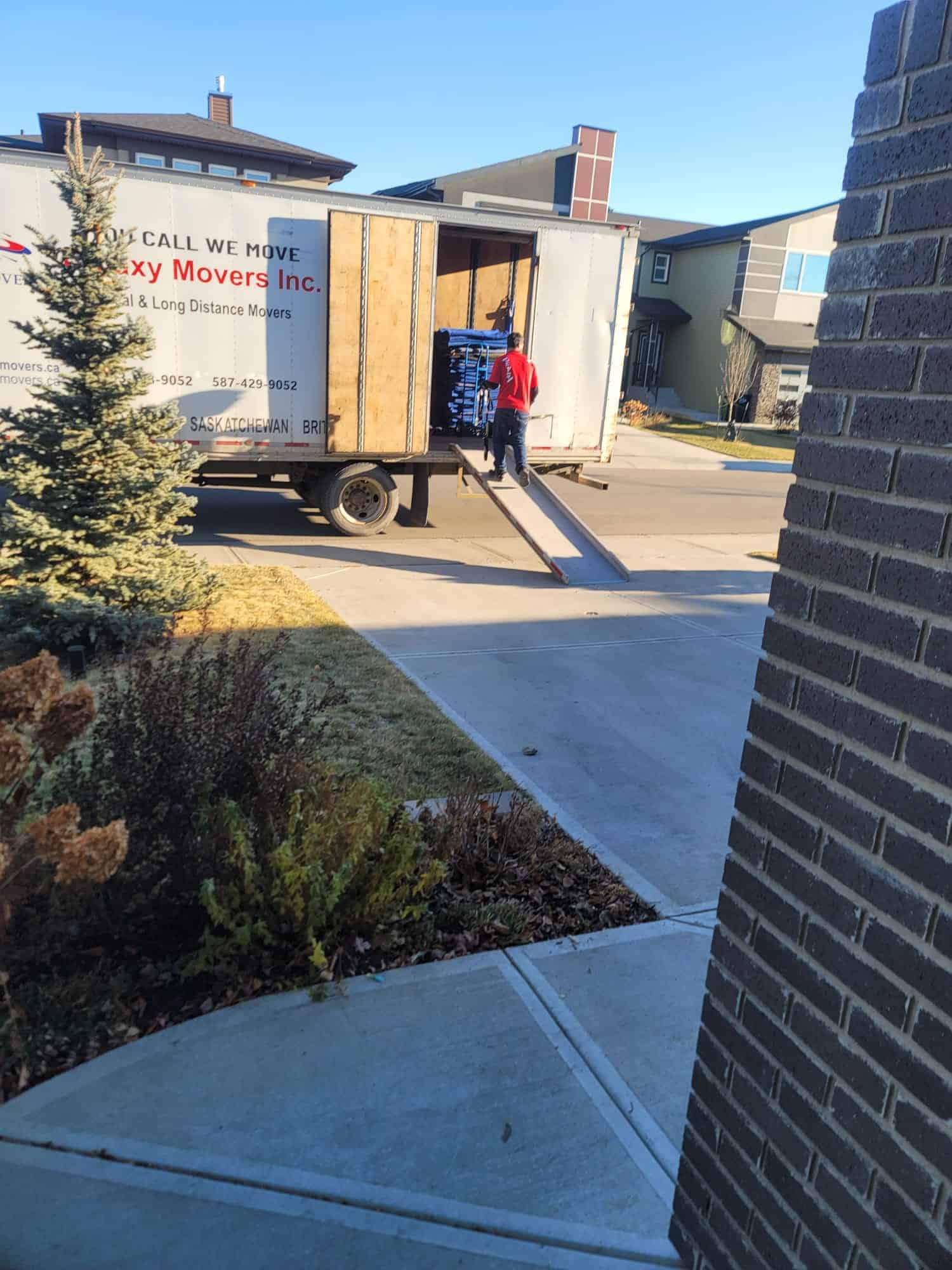 Moving truck en route on Canadian highway for long distance moving
